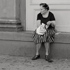 Christoph Radke, New York City, an elderly lady sittung on a doorstep, 2005